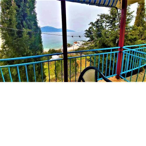 Third Room of Cozy Beachside Haven - Panoramic Radhime Retreat with Balcony Dining