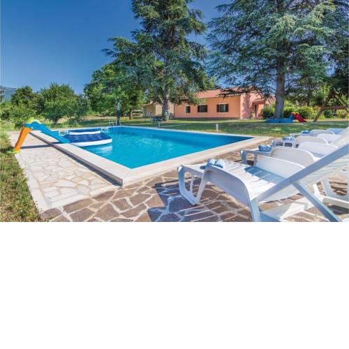 Three-Bedroom Holiday home Krsan with an Outdoor Swimming Pool 07