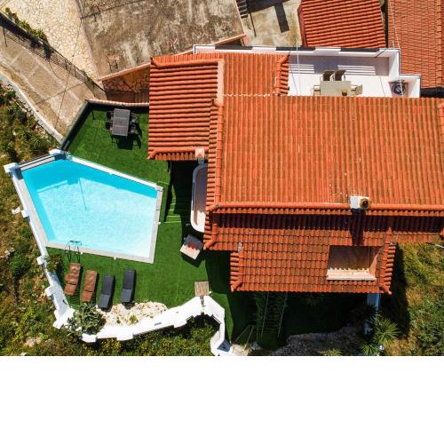 THREE STOREY VILLA WITH INFINITY POOL AT KAMINARATA VILLAGE 12 guests