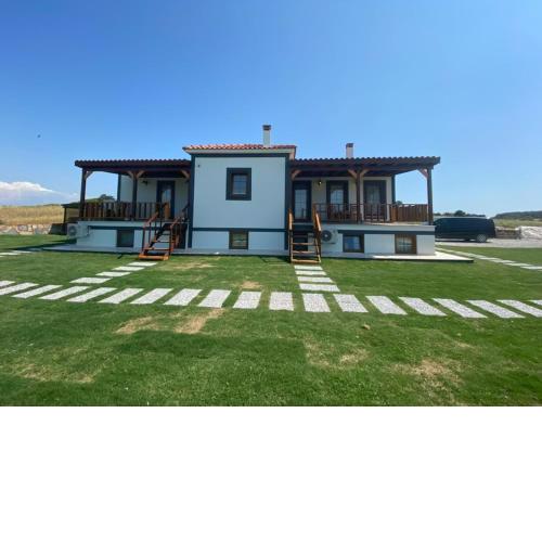 Tinos Otel & Bağ Evi