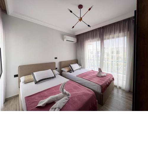 Twin house 4 master Bedrooms premium mountain view Ras Elhikma
