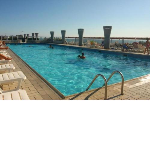 Two-Bedroom Apartment in residence with balcony and swimming pool
