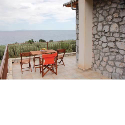 Two-Bedroom Holiday Home in Andreas Paralio