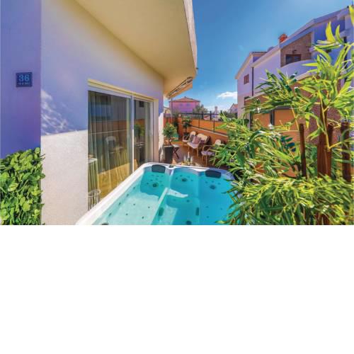 Two-Bedroom Holiday Home in Okrug Gornji