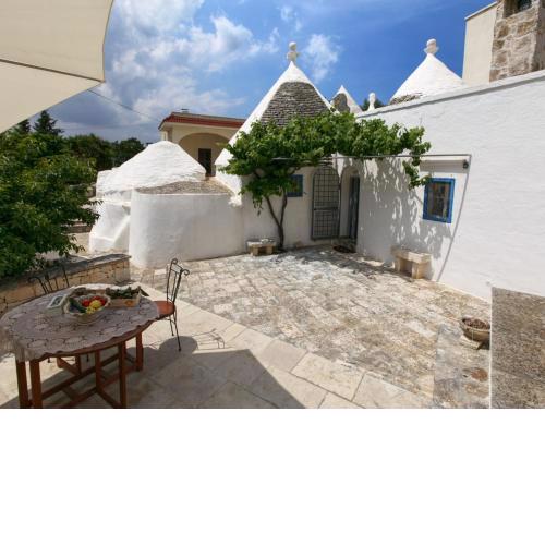 Typical trullo with conical roof in excellent area close to the sea