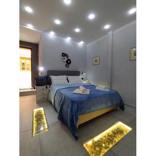Vasiliki's old town luxury rooms