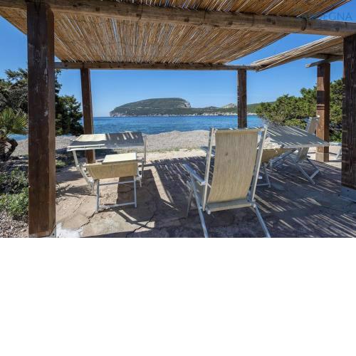 Villa Capo Caccia con vista mare con piscina e spiaggia privata