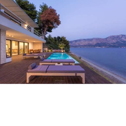 Villa Kastos. Beachfront 4 bed villa with private pool.
