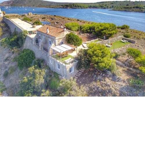 Villa with 4 bedrooms in Fornells Menorca with wonderful sea view furnished garden and WiFi 100 m from the beach