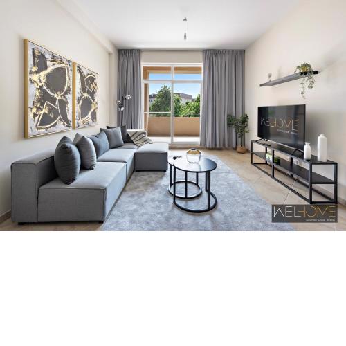 WelHome - Prime Apartment With Balcony Amidst Lively Area