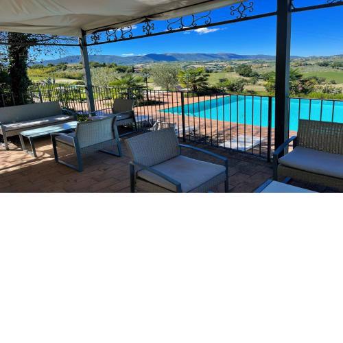 Wondrous covered veranda besides infinity pool Jacuzzi in magical gardens