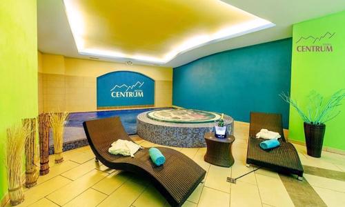 Krkonoše stylově v Hotelu Centrum Harrachov *** s bazénem, saunou, procedurami a polopenzí + slevová karta