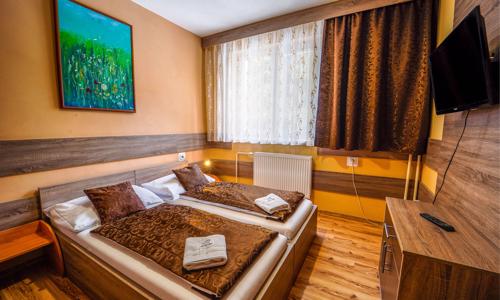 Nízké Tatry u skiareálů a Tatralandie: Penzion Limba *** s polopenzí a bazénem