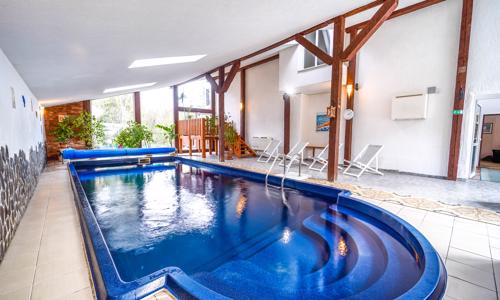 Vysoké Tatry u ski areálů ve stylovém srubovém domečku u Hotelu Nezábudka *** s polopenzí a wellness